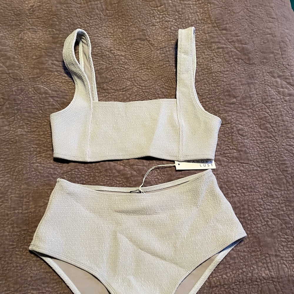 Top and Bottom from Wanderlust swim. Brand new never worn. NWT